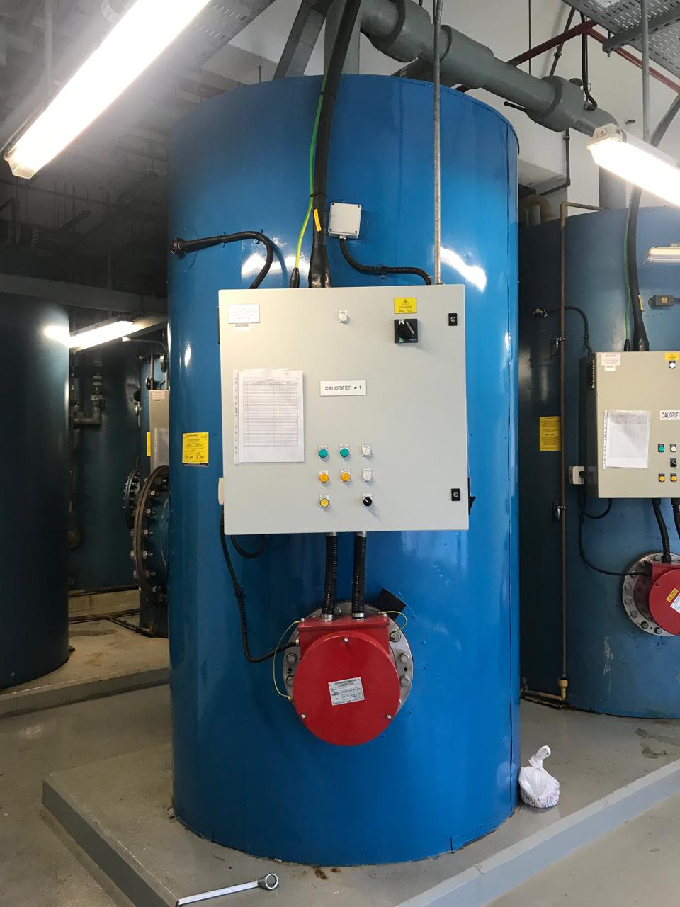 Electric hot water calorifiers in a plant room