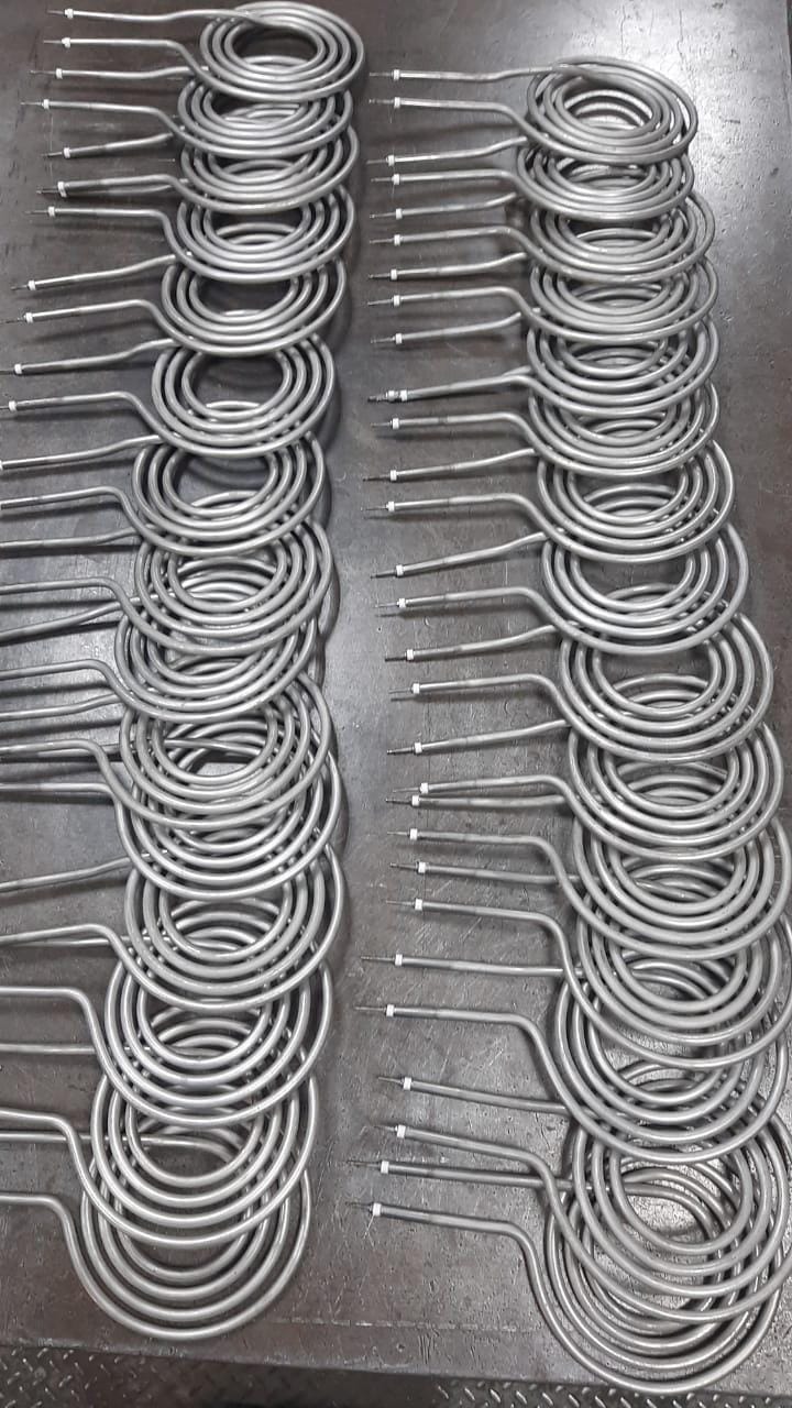 Spiral tubular heating coils in production at the AME workshop