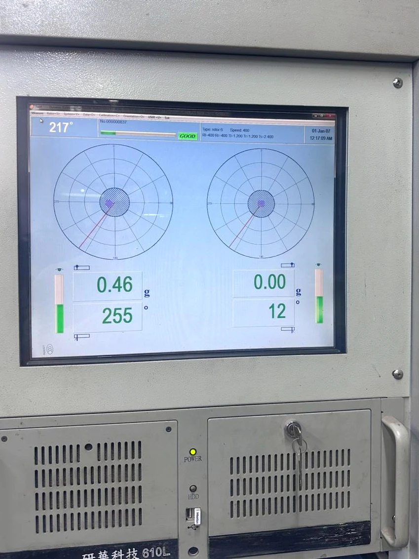 Dynamic balancing machine screen showing a GOOD result: 0.46 g at 255 degrees and 0.00 g at 12 degrees