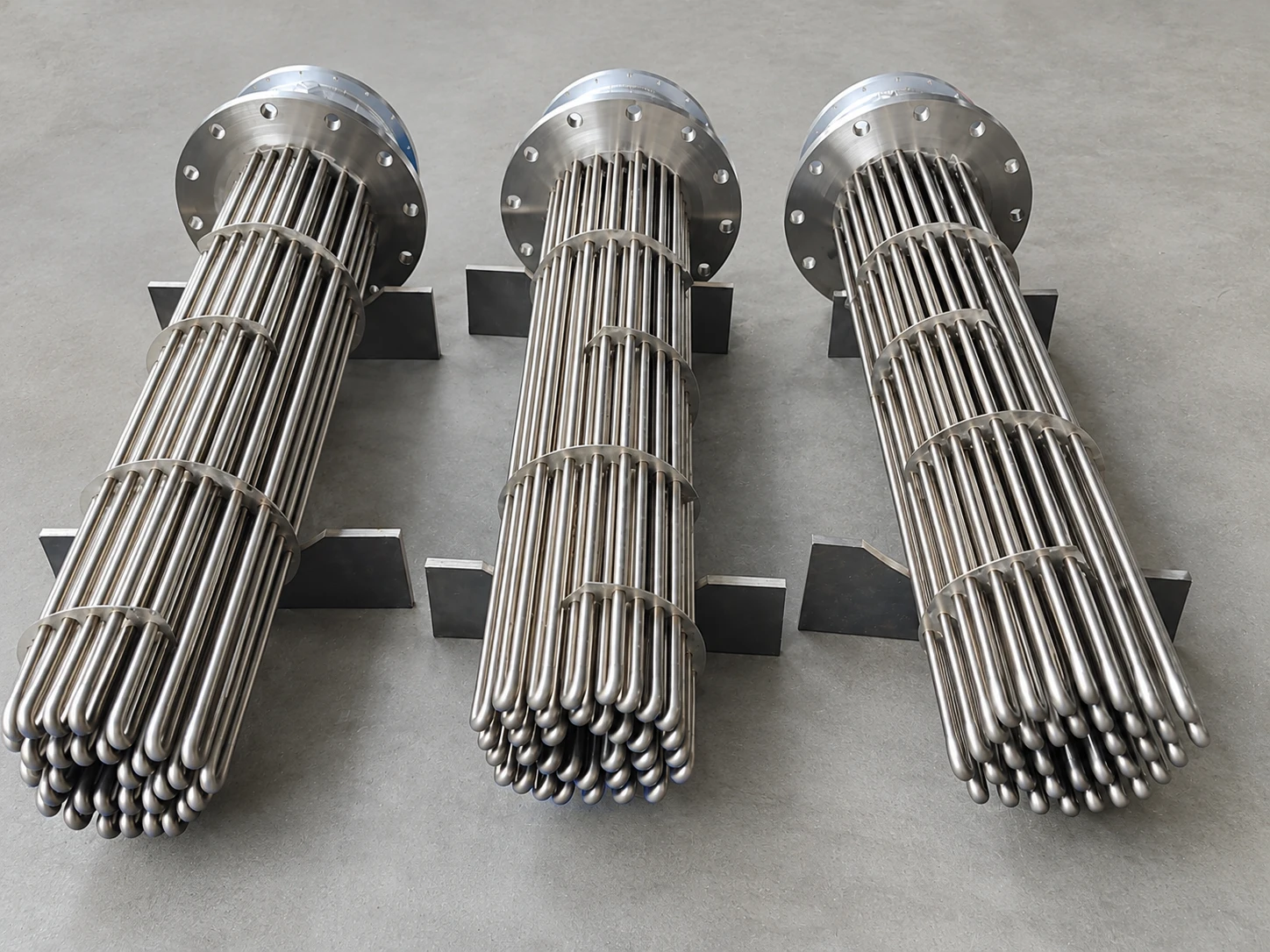 Three flange immersion heater bundles manufactured in the AME workshop
