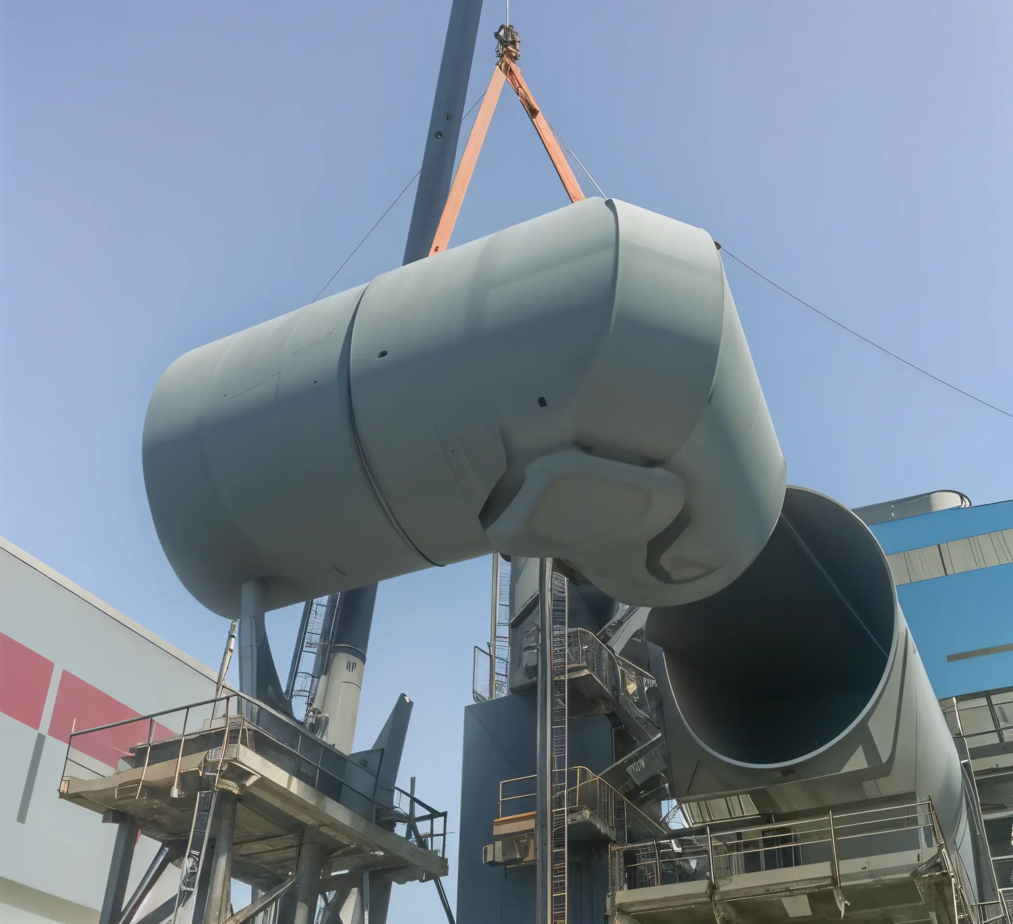 Steel duct section lifted into position
