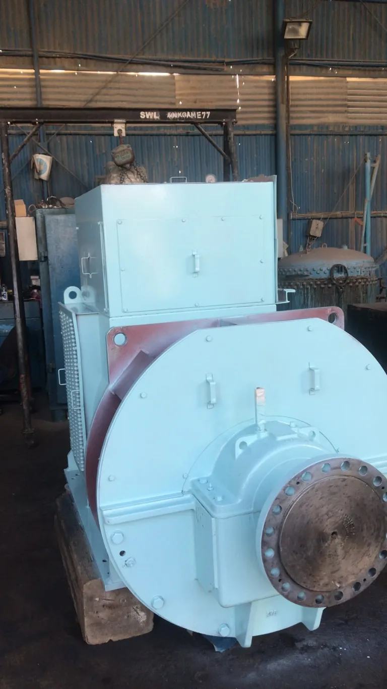 Large alternator in the workshop after overhaul and repainting
