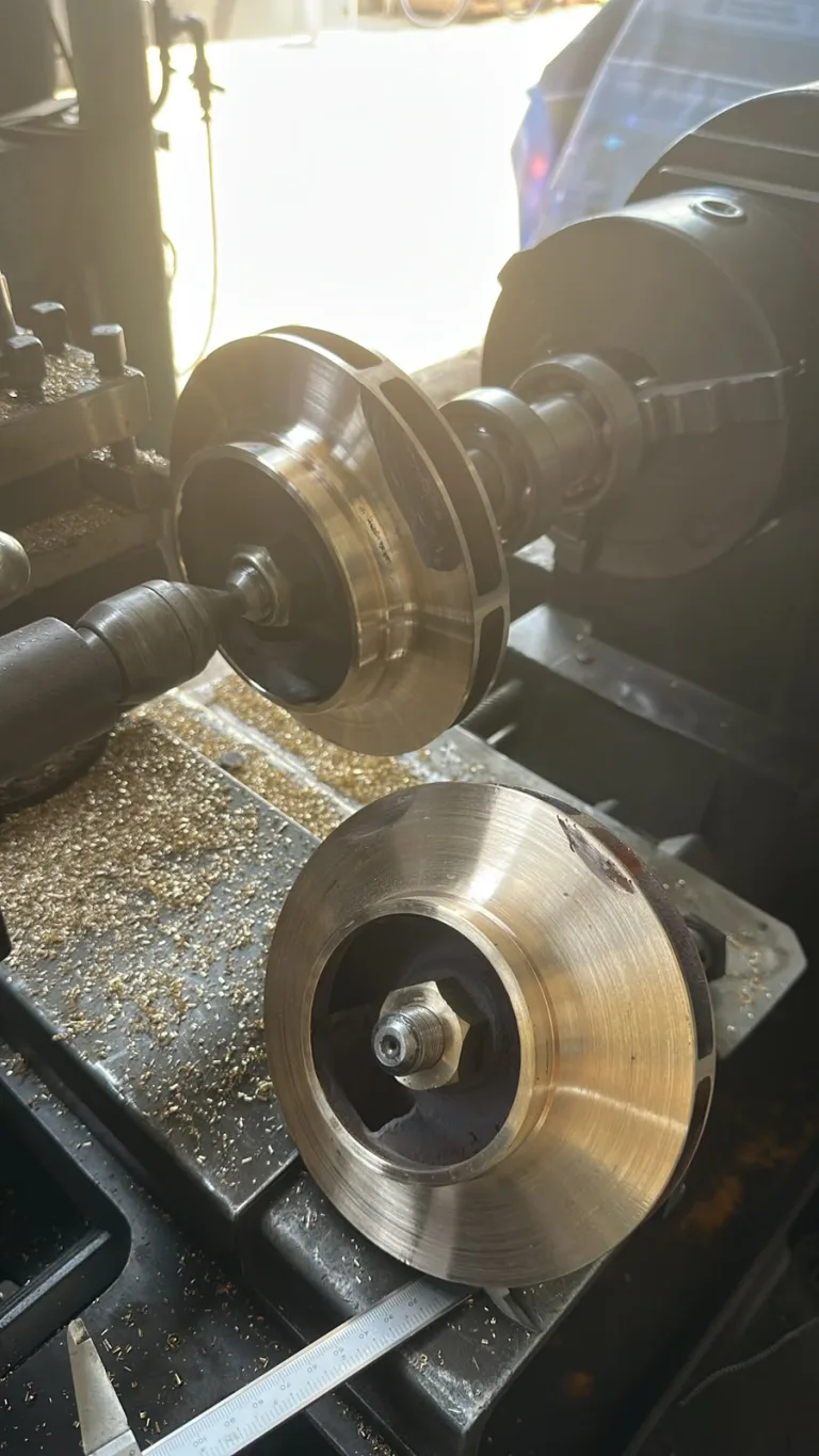 Pump impellers being machined on the lathe in our Dubai machine shop